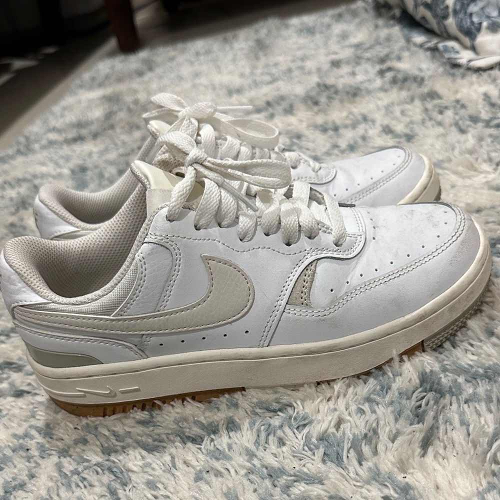 Nike White Low-Top Sneakers with Cream Swoosh